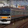 Photos: 休日運転のため西荻窪駅を通過する209系快速電車